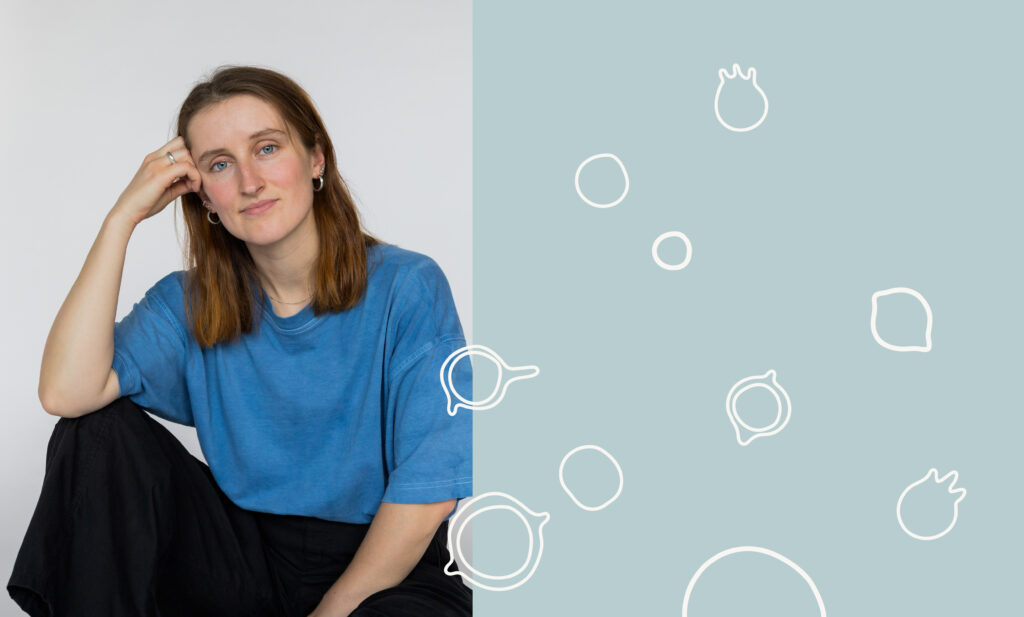 A portrait of jeweler Milda Palivonaitė with graphics representing her jewelry design. The photo’s background is split: on the left, Milda is sitting in a blue shirt; on the right, abstract white lines are scattered across a soft blue backdrop, reflecting the forms and aesthetics of her pieces.